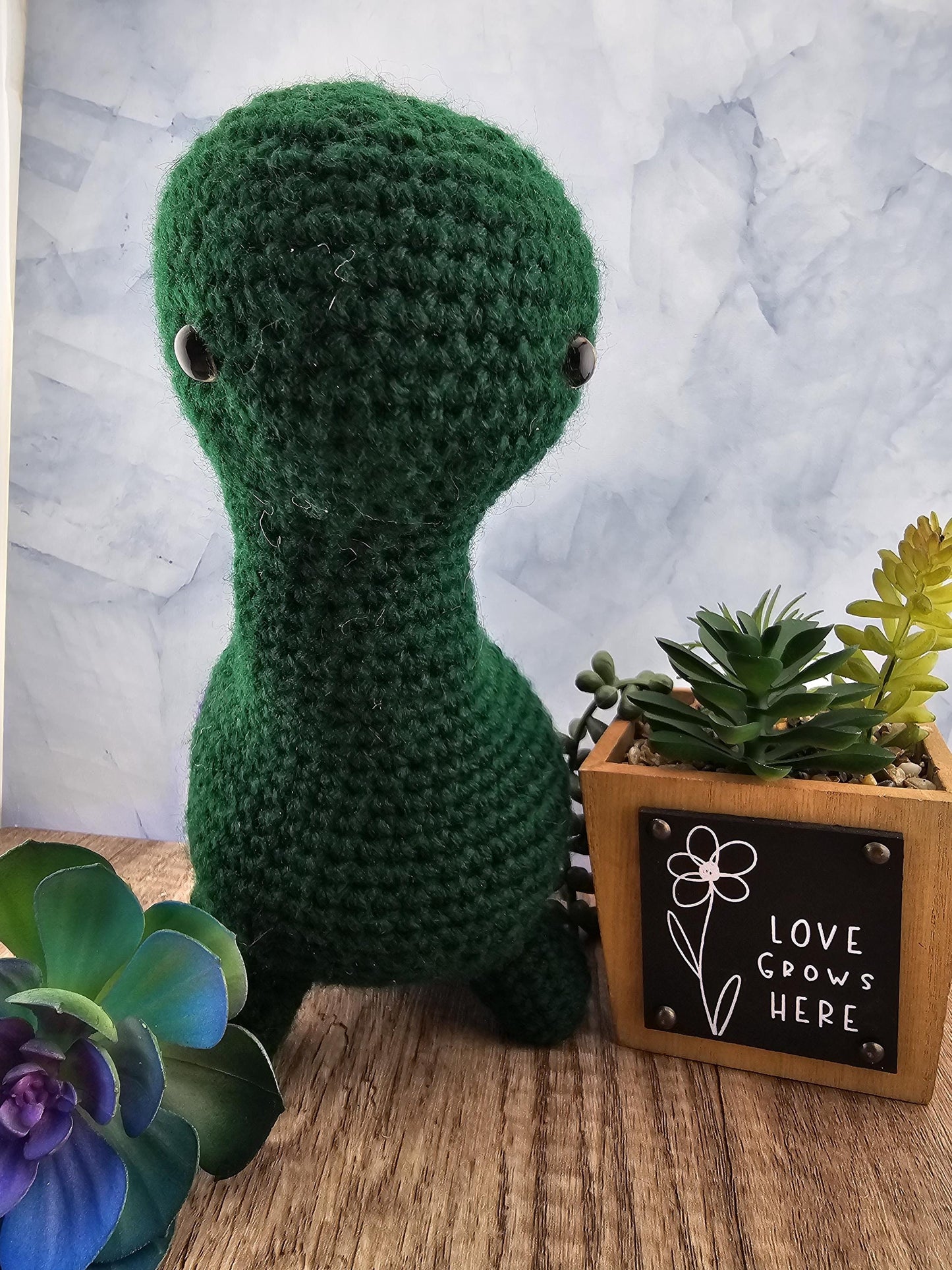 Handcrafted crocheted Green Dinosaur buddy named Barney