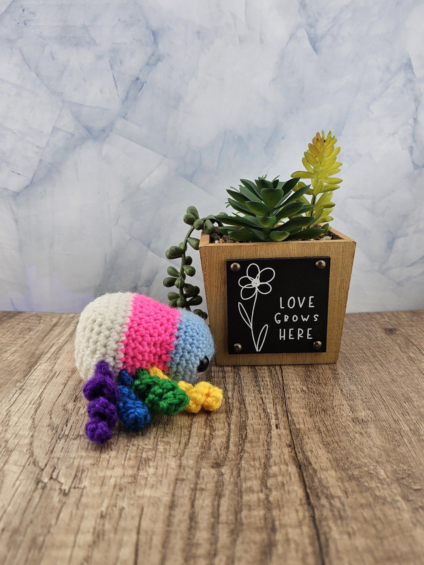 Handcrafted crocheted pride flag Spider buddy named Justice