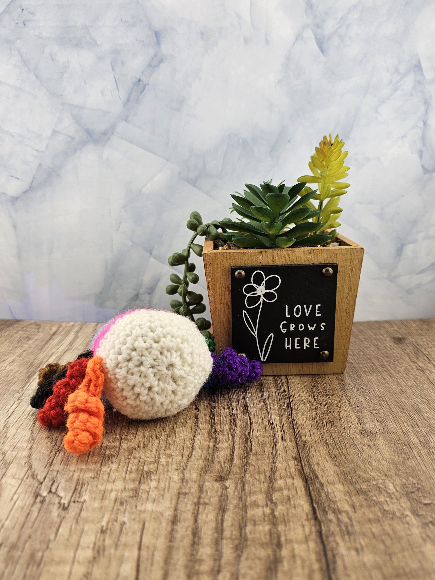 Handcrafted crocheted pride flag Spider buddy named Justice