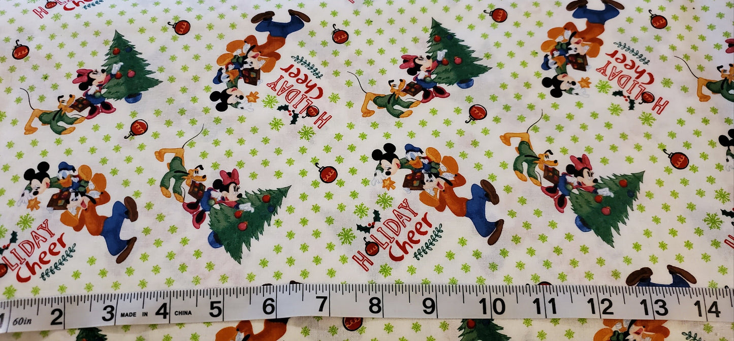 Mickey & Friends Trim the Christmas Tree Disney Fabric by the half yard. 100% Cotton.