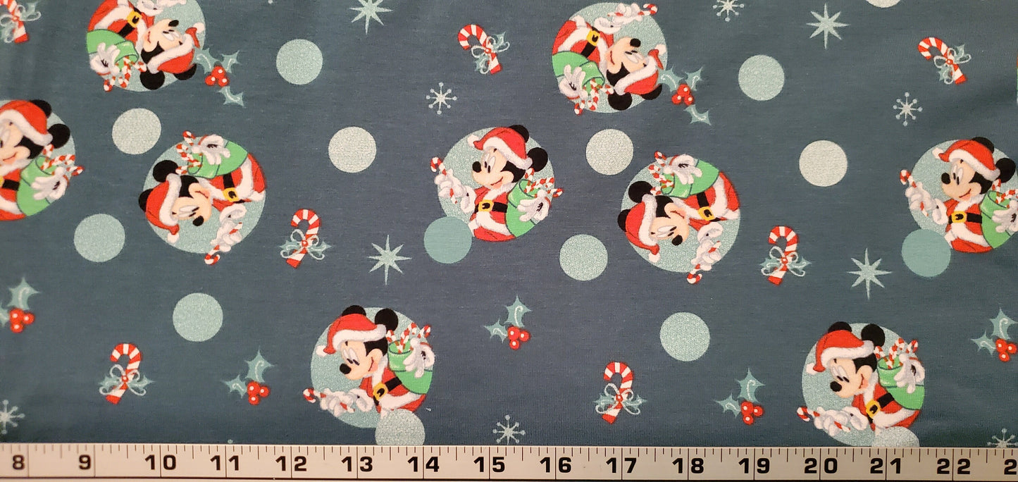 Disney MICKEY MOUSE Teal Background- Christmas Badges Fabric by the half yard. Cotton/Spandex