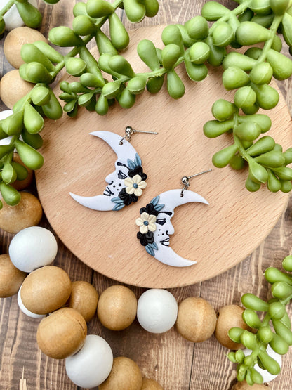 Floral freckled moon clay dangle earrings