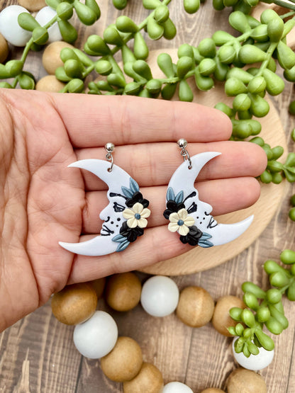 Floral freckled moon clay dangle earrings