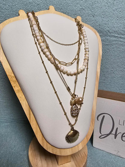 Elegant Tommy Bahama Layered Pearl & Gold Necklace