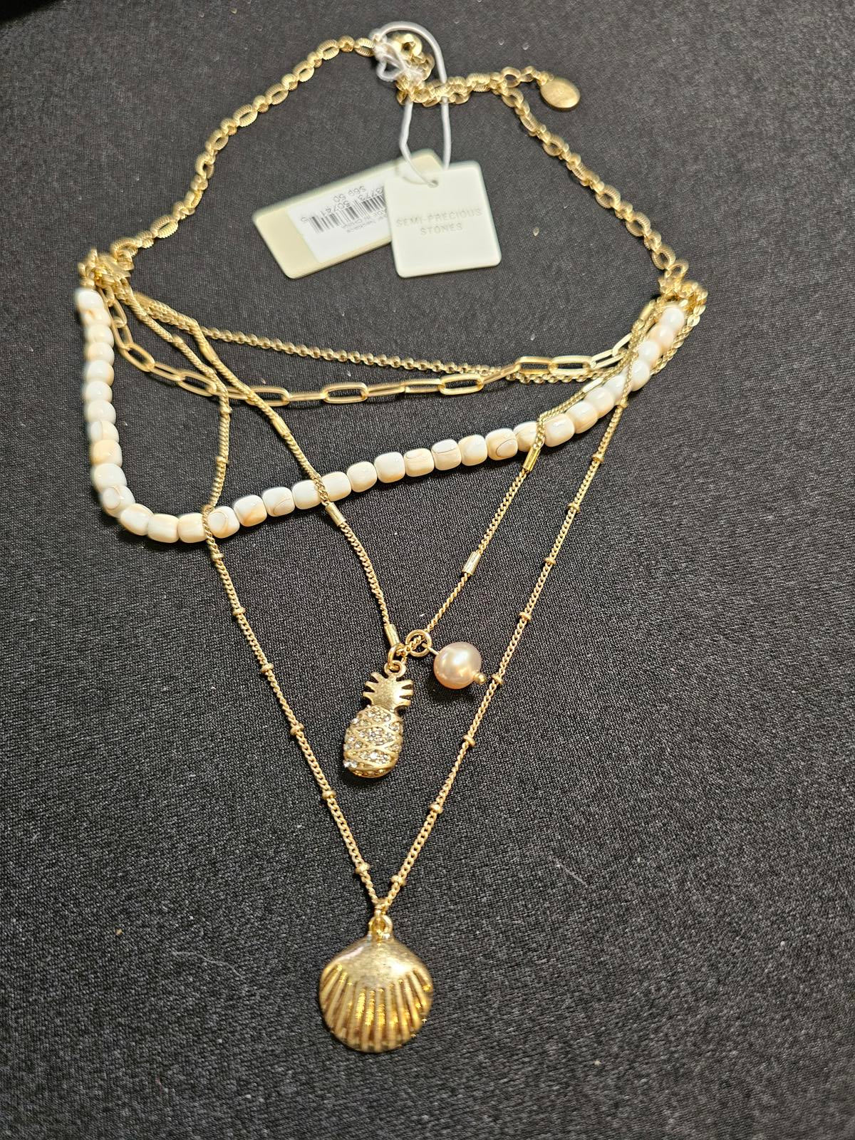Stylish Layered Gold Necklace with Shell and Pineapple Pendants