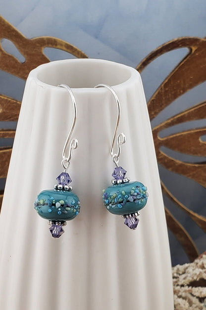 Lavender Bliss Artisan Glass Earrings, Lampwork Glass Bead handcrafted by a talented artisan, Silver Filled Earring Wire. Lavender and Teal Green beads.