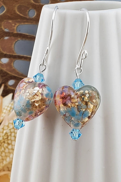 Fall in Love Artisan Glass Earrings, Lampwork Glass Bead handcrafted by a talented artisan, Silver Filled Earring Wire. Copper, blue and red swirls inside glass hearts accented with Blue crystal beads. Faill in love with autumn colors.