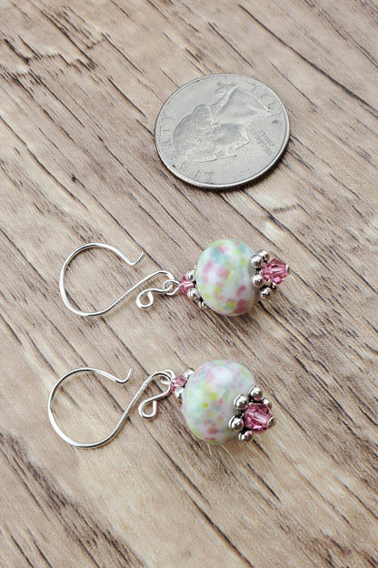 Robins egg Artisan Glass Earrings, Lampwork Glass Bead handcrafted by a talented artisan, Silver Filled Earring Wire. Lampwork beads filled with pink, green and yellow speckles complimented by pink crystal beads.