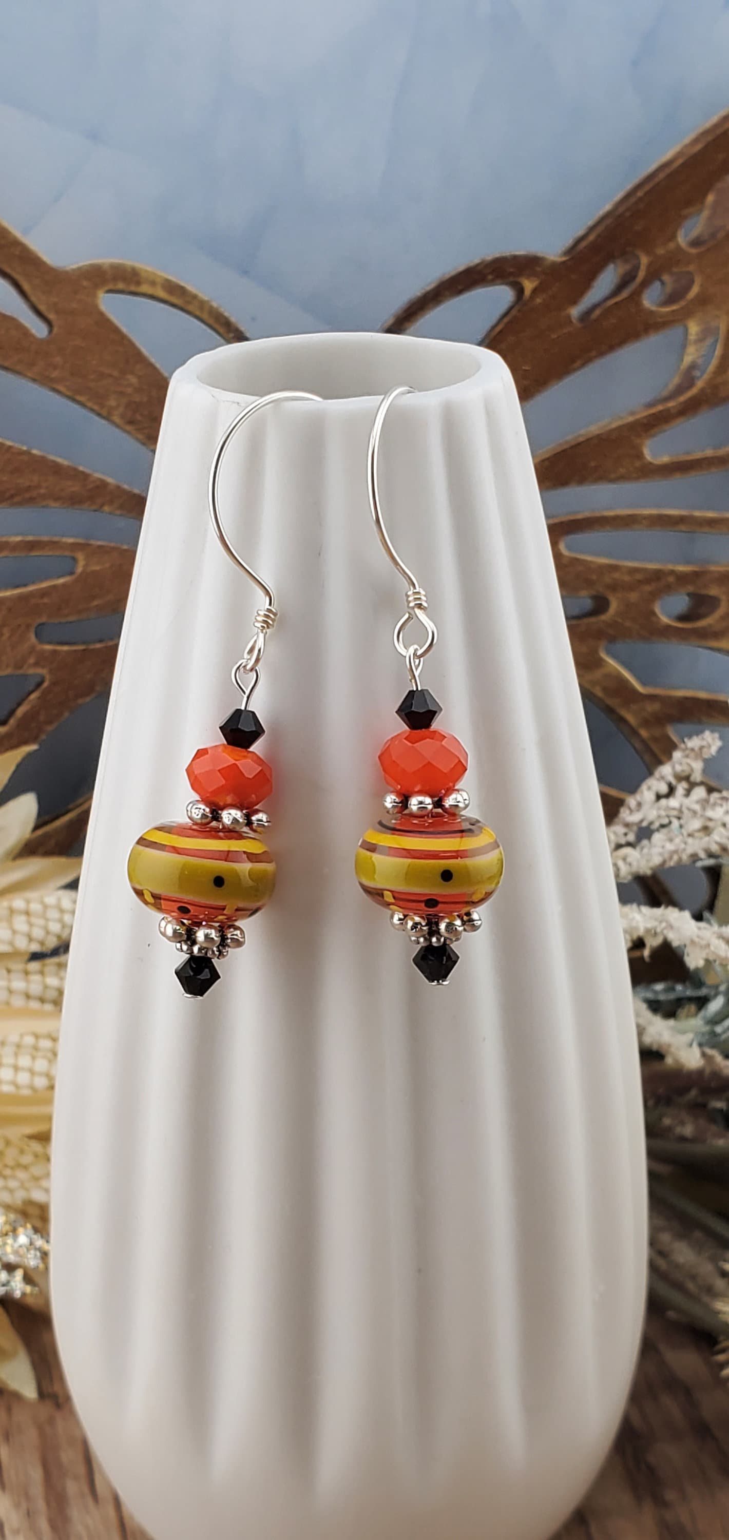 Siesta Time Artisan Glass Earrings, Lampwork Glass Bead by Grace Lampwork Beads, Sterling Silver Earring Wire. Orange, Yellow and Black colors make these earrings fun.