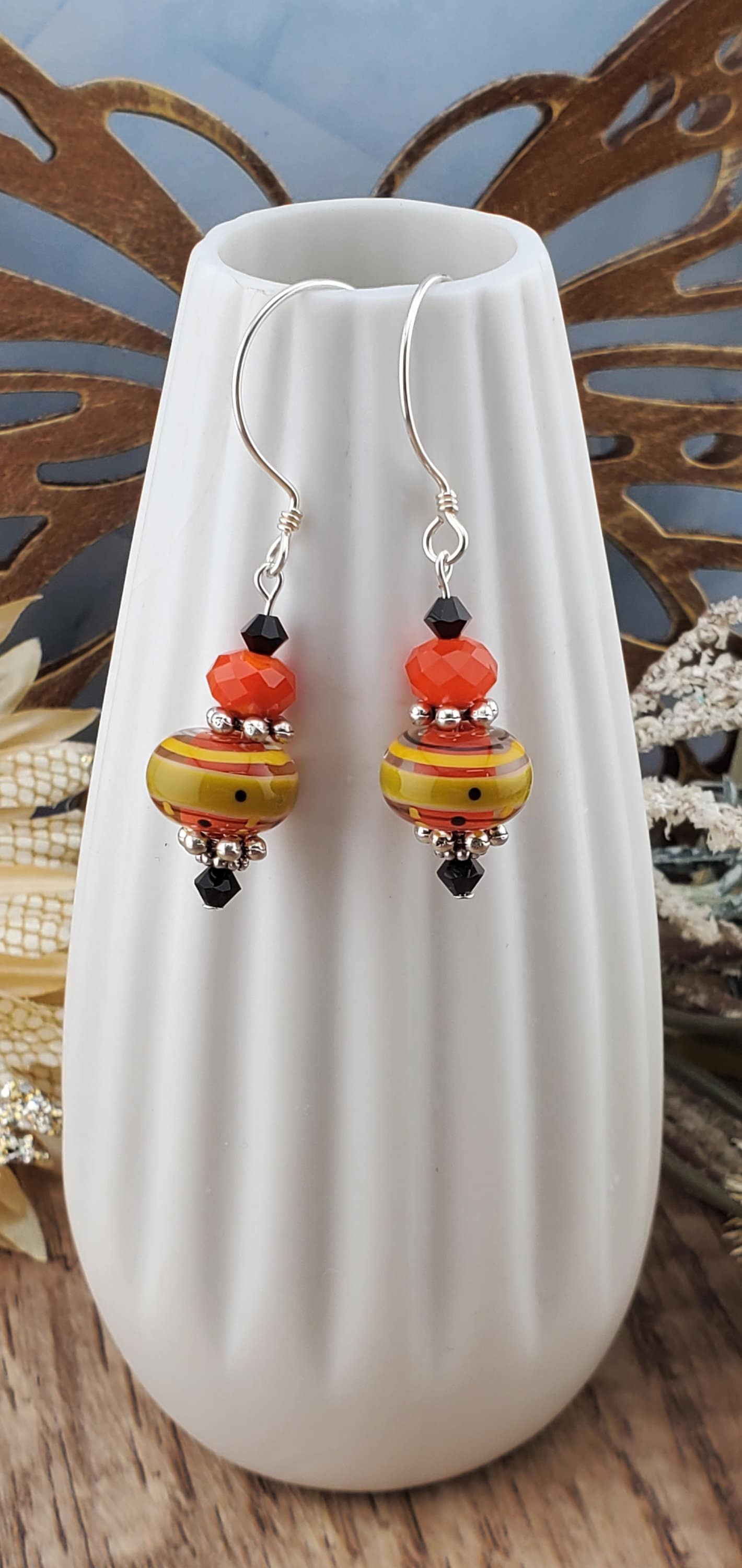 Siesta Time Artisan Glass Earrings, Lampwork Glass Bead by Grace Lampwork Beads, Sterling Silver Earring Wire. Orange, Yellow and Black colors make these earrings fun.