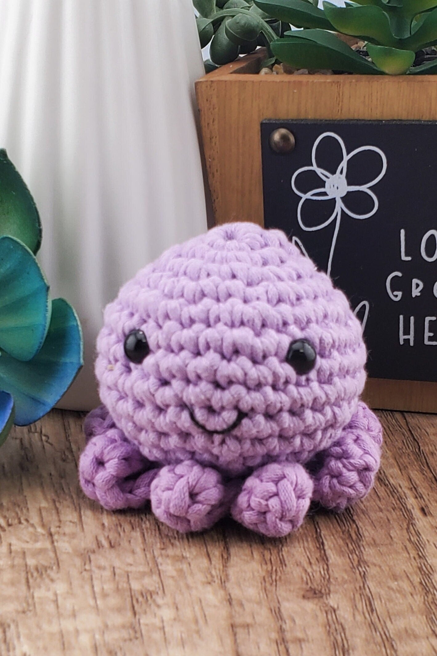 Handcrafted crocheted purple Octopus buddy named Olivia