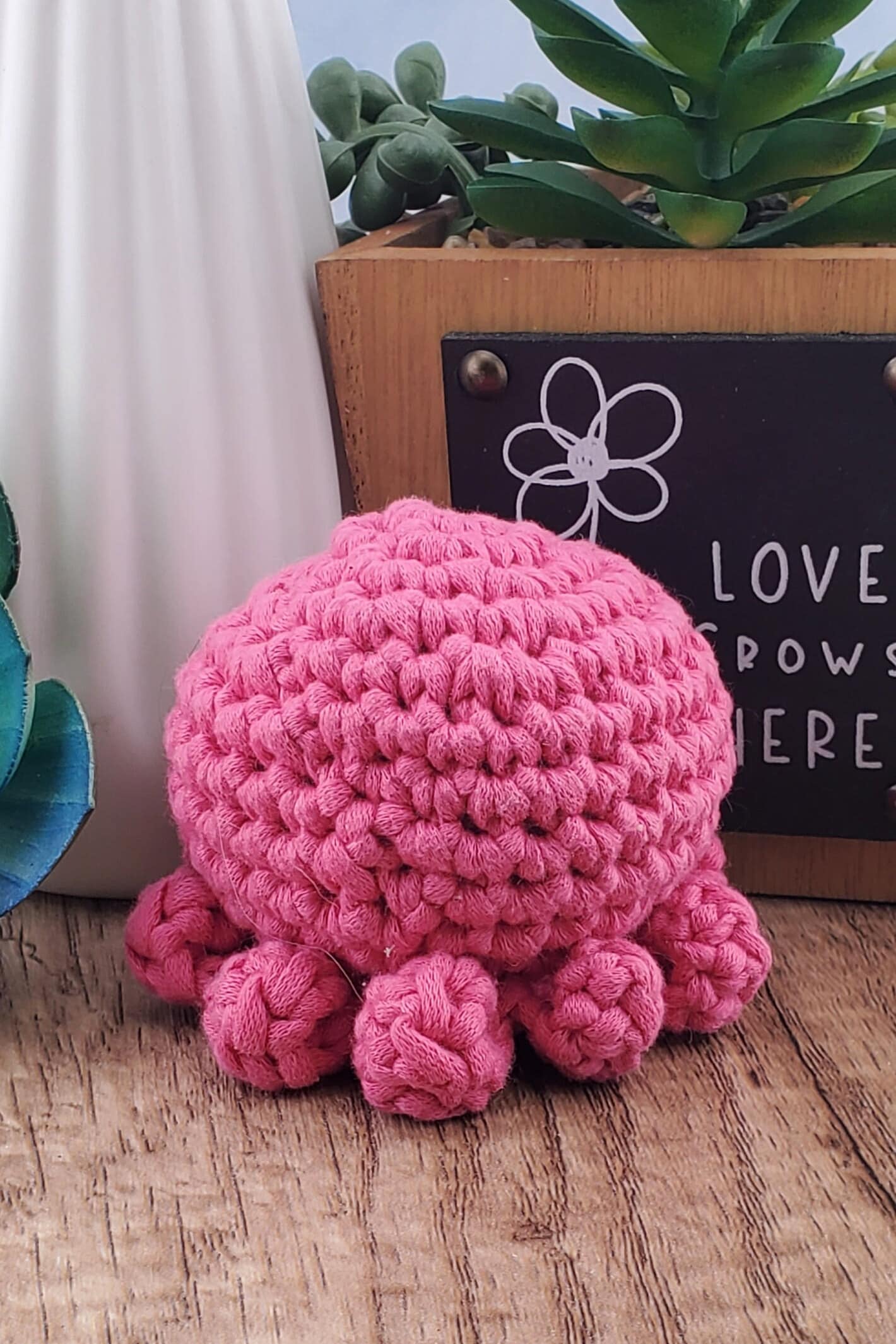 Handcrafted crocheted pink Octopus buddy named Ophelia