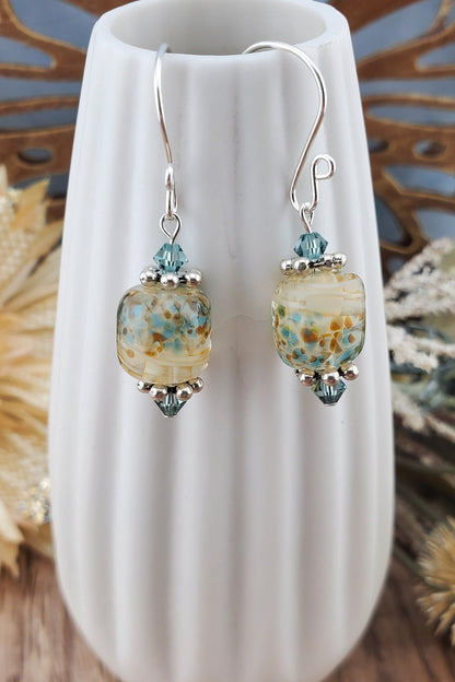 SF Sandy Shores Artisan Glass Earrings, Lampwork Glass Bead handcrafted by a talented artisan, Silver Filled Earring Wire. Soft blue green beads and a soft blue green along with cream color lampwork glass bead.