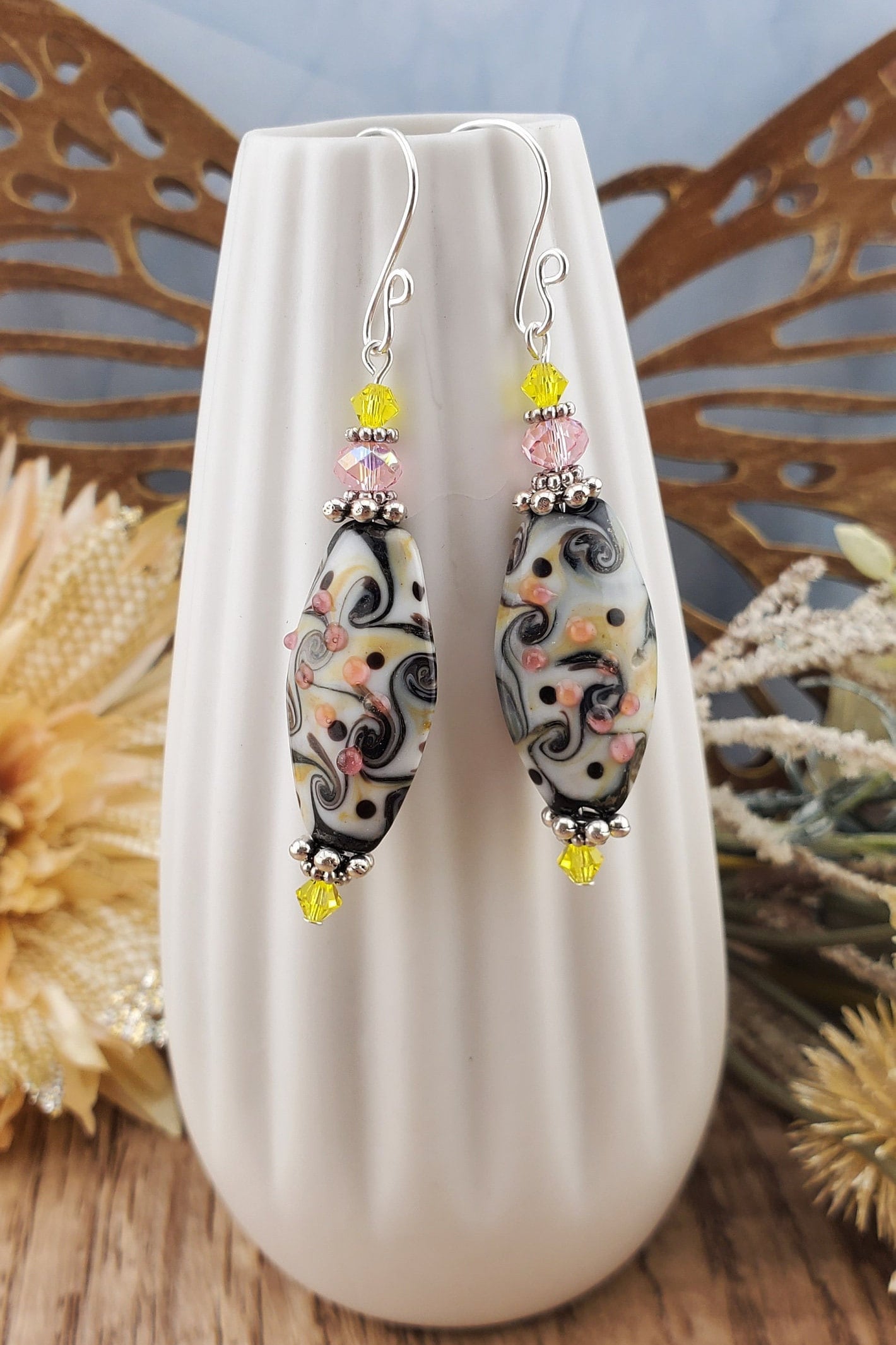 SF Kaleidoscope Artisan Glass Earrings, Silver Filled Earring Wire. Yellow, Pink, Black and Cream fill this Glass bead.