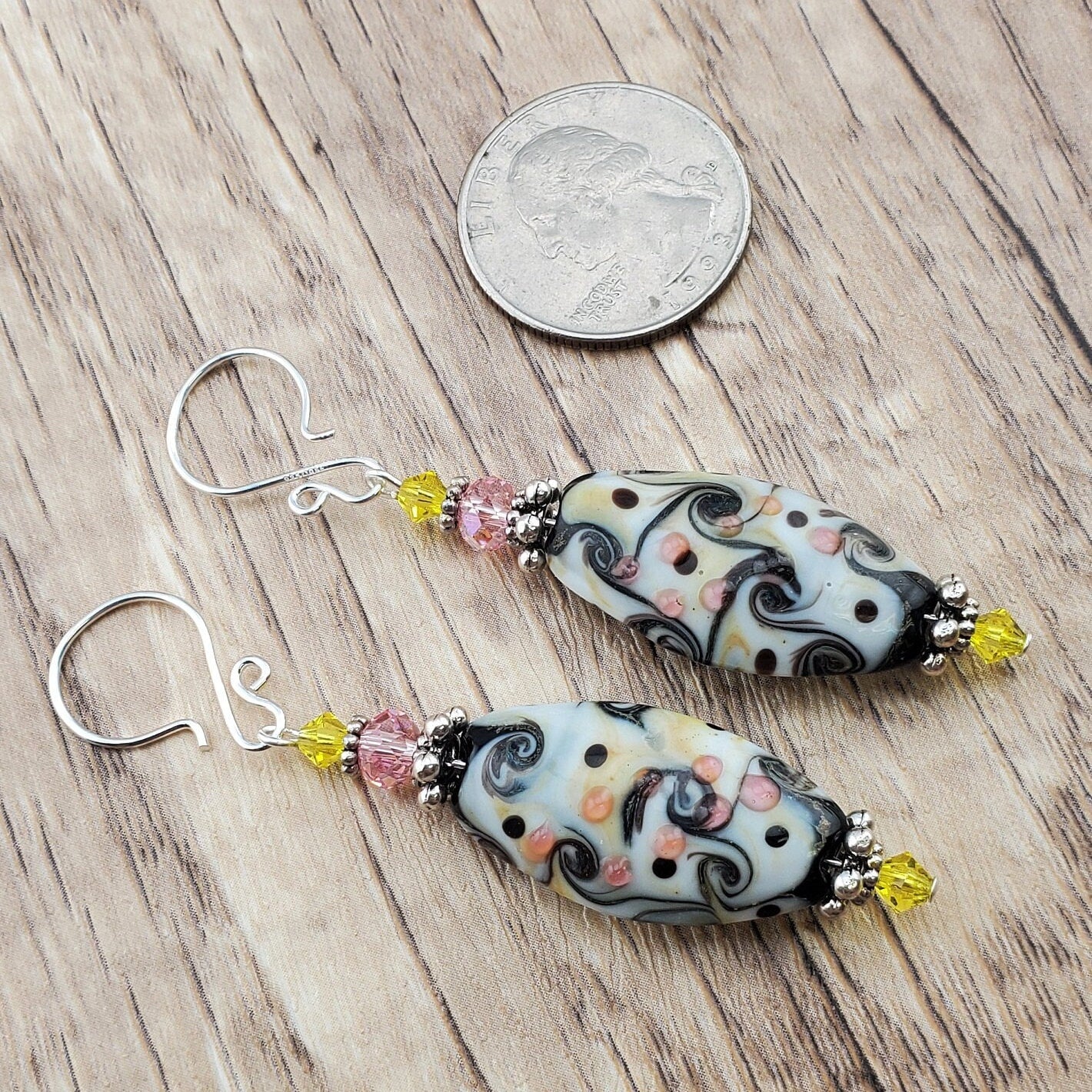 SF Kaleidoscope Artisan Glass Earrings, Silver Filled Earring Wire. Yellow, Pink, Black and Cream fill this Glass bead.