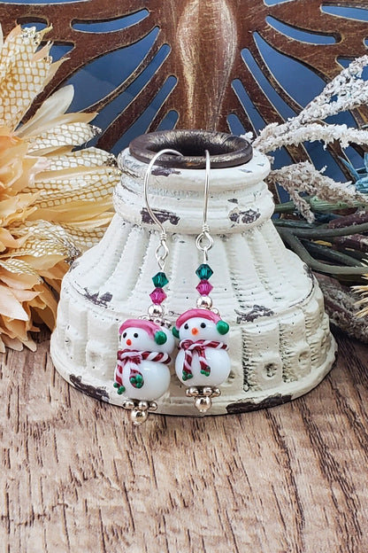 Frosty Elegance Artisan Glass Earrings, Sterling Silver Earring Wire, Snowman with green and pink crystal beads.wearing a scarf