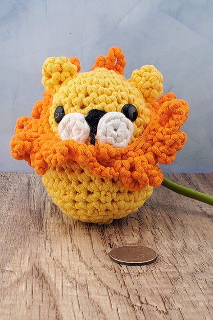 Handcrafted crocheted Lion buddy named Lionel. Yellow with an orange mane.