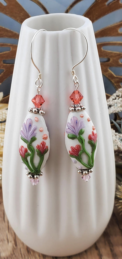 SF Love Blooms Artisan Glass Earrings, Silver Filled Earring Wire. Purple and Pink Flowers are abloom in these earrings.