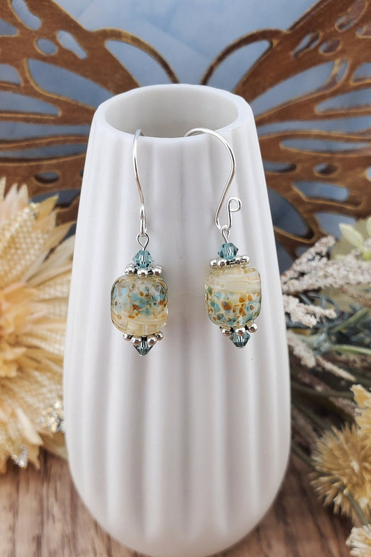 SF Sandy Shores Artisan Glass Earrings, Lampwork Glass Bead handcrafted by a talented artisan, Silver Filled Earring Wire. Soft blue green beads and a soft blue green along with cream color lampwork glass bead.