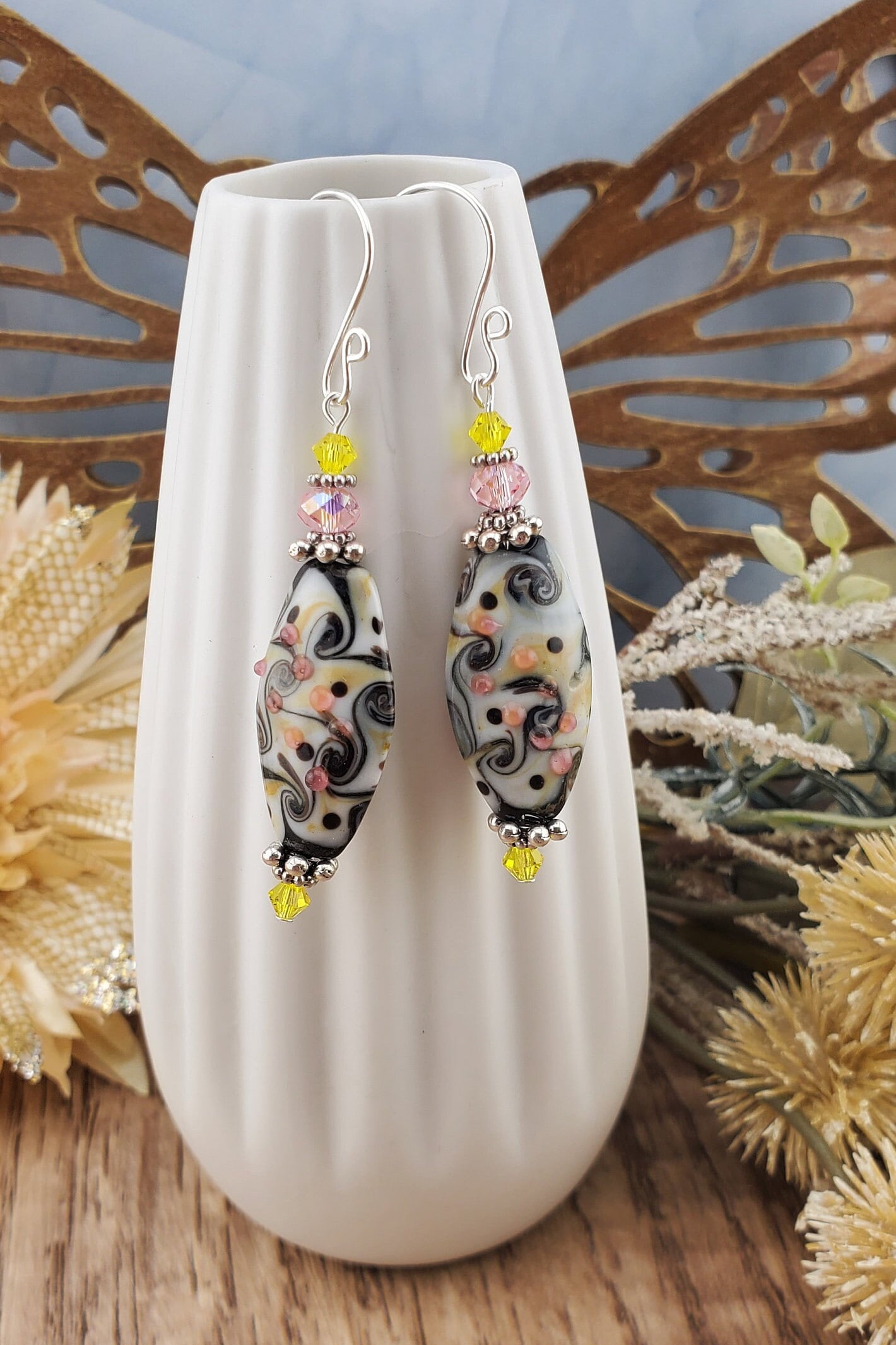 SF Kaleidoscope Artisan Glass Earrings, Silver Filled Earring Wire. Yellow, Pink, Black and Cream fill this Glass bead.