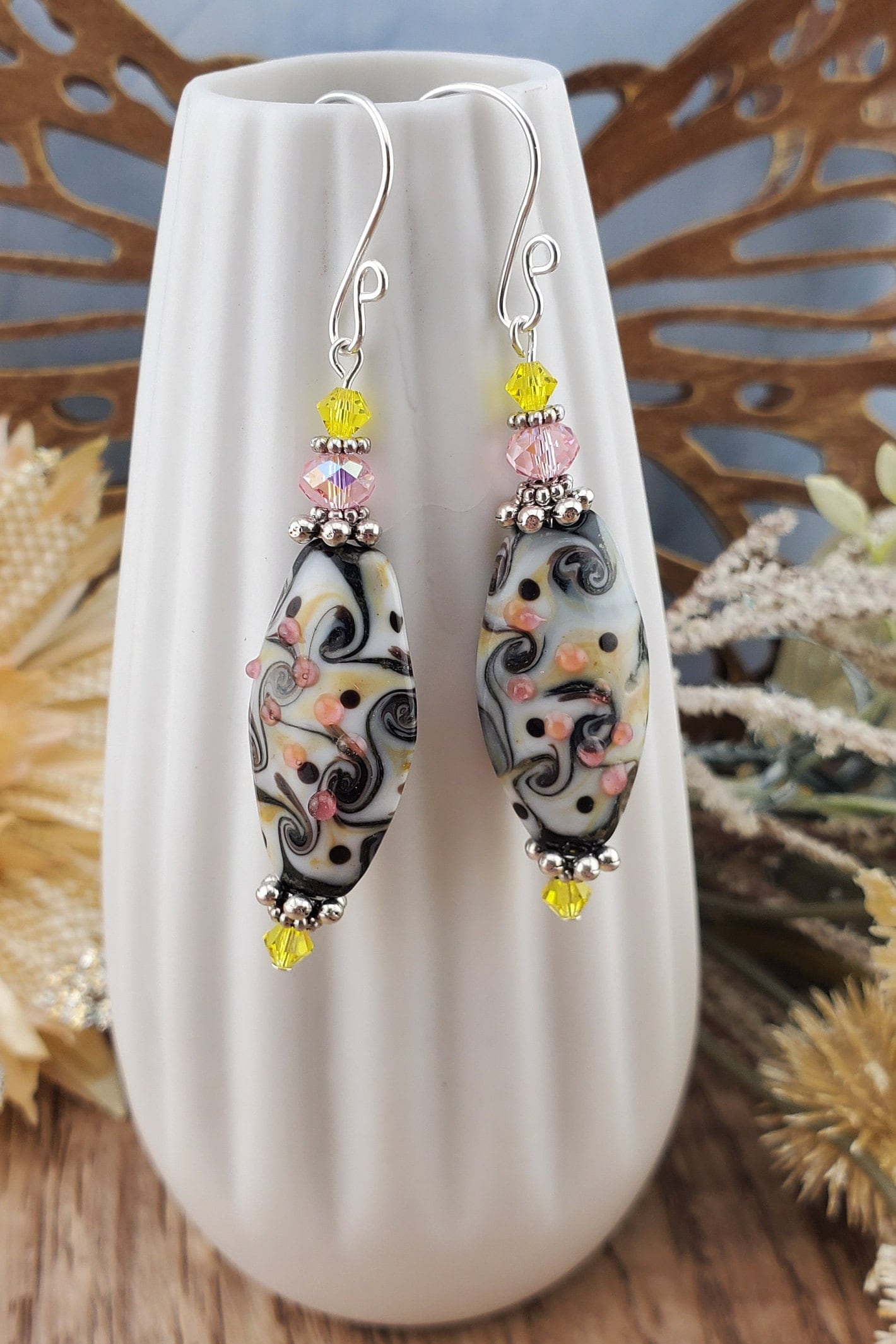 SF Kaleidoscope Artisan Glass Earrings, Silver Filled Earring Wire. Yellow, Pink, Black and Cream fill this Glass bead.