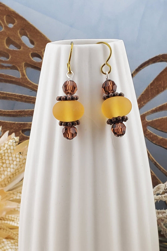 NI Amber Honey Artisan Glass Earrings, Lampwork Glass Bead by a talented artisan, Niobium Earring Wire. Amber and Honey golden beads accented with copper findings.