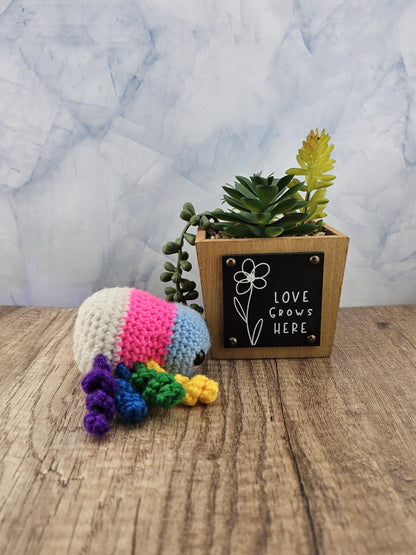 Handcrafted crocheted pride flag Spider buddy named Justice