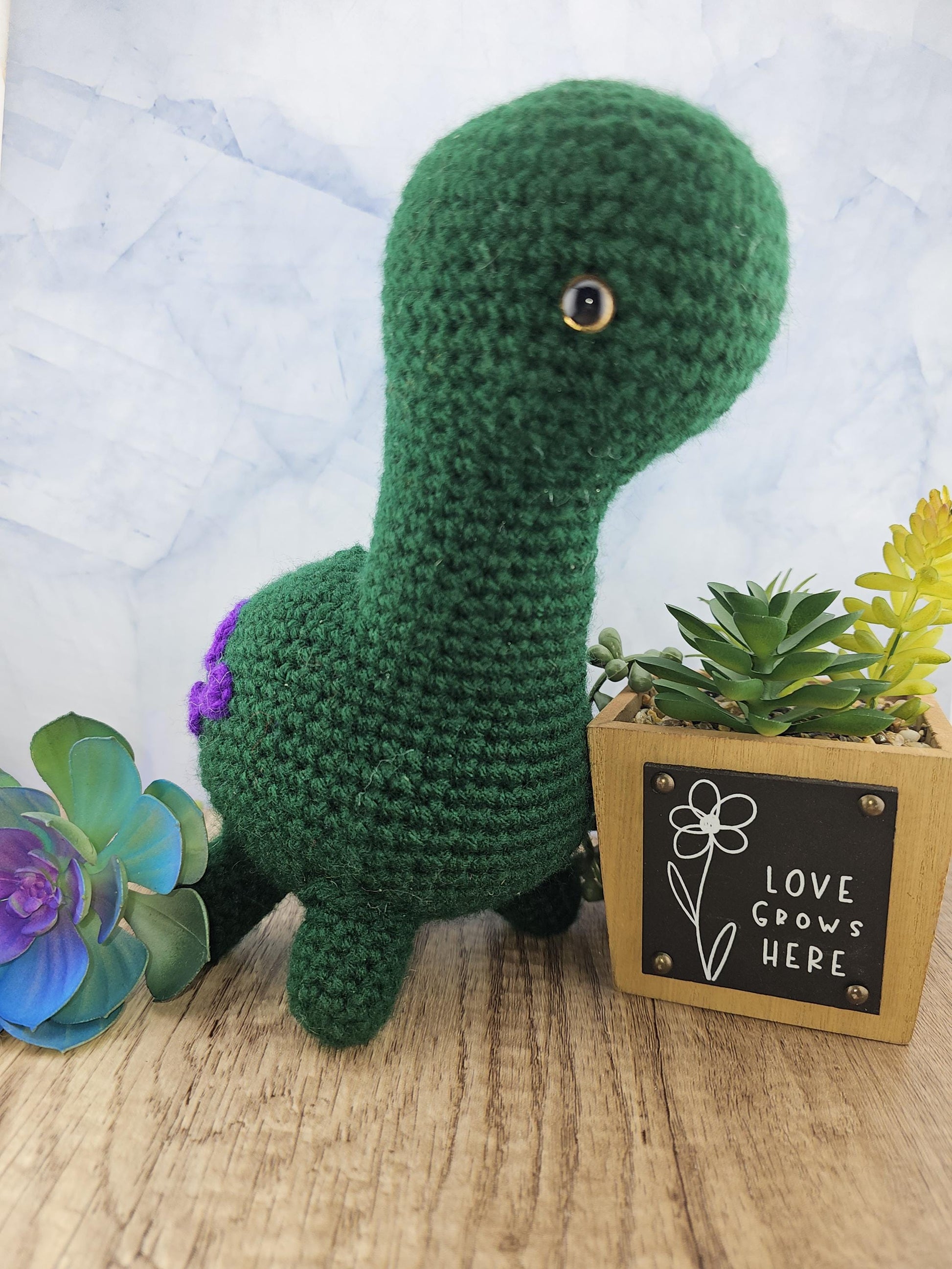 Handcrafted crocheted Green Dinosaur buddy named Barney