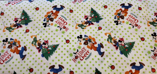 Mickey & Friends Trim the Christmas Tree Disney Fabric by the half yard. 100% Cotton.