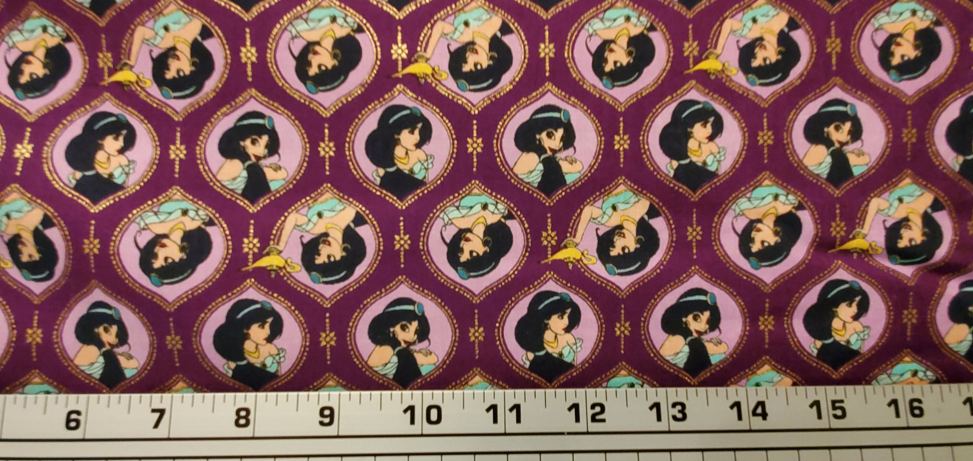Disney Aladdin frames PRINCESS JASMINE METALLIC Fabric by the half yard. 100% Cotton.