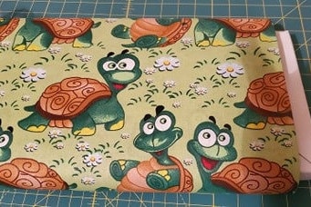 Goofy Turtles Fabric by the half yard. 100% Cotton.