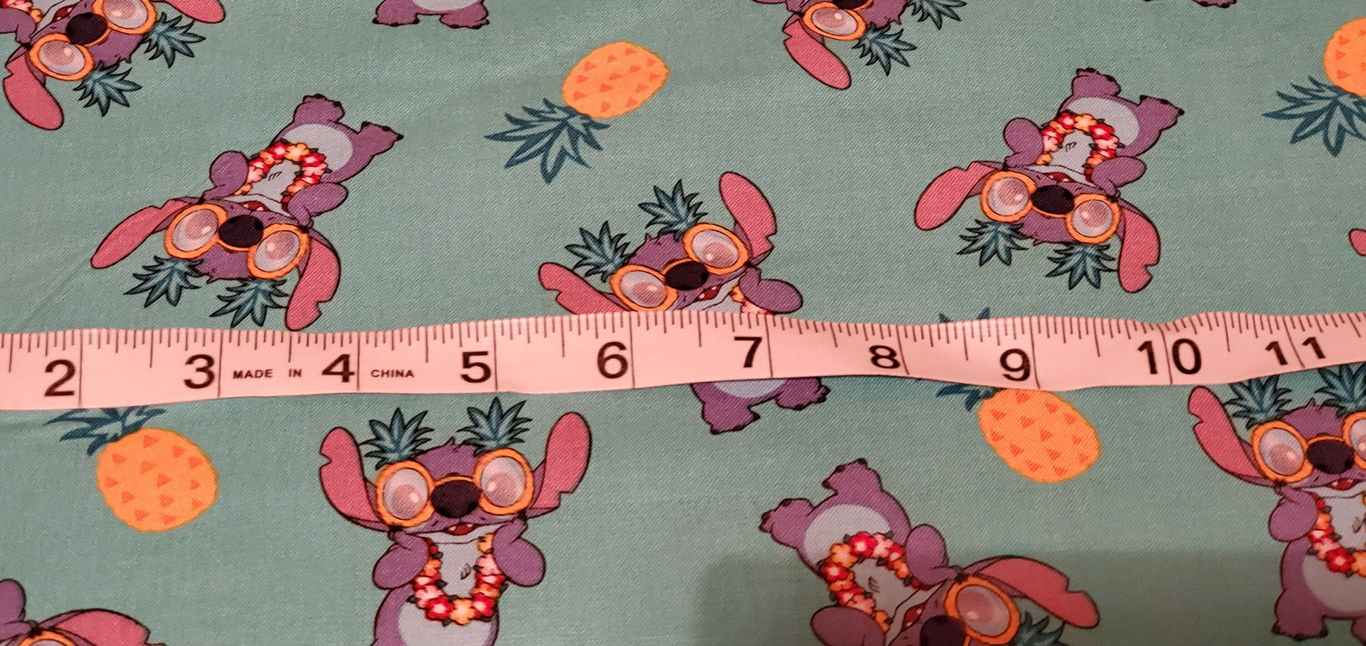 Disney Stitch Pineapple Fabric by the half yard. 100% Cotton.