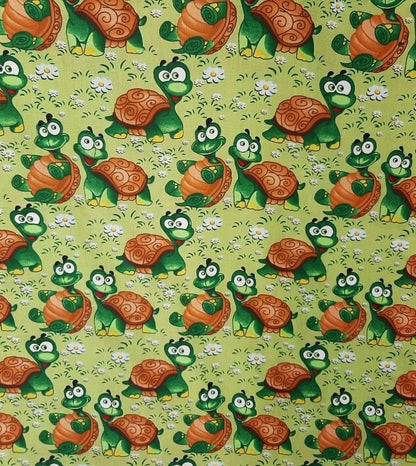 Goofy Turtles Fabric by the half yard. 100% Cotton.