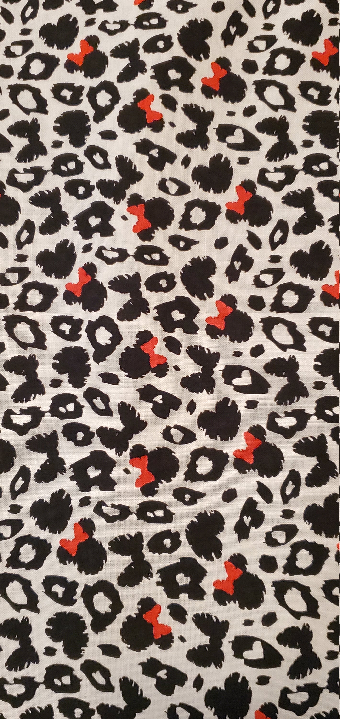 Minnie Mouse Cheetah Print Fabric by the half yard. 100% cotton.