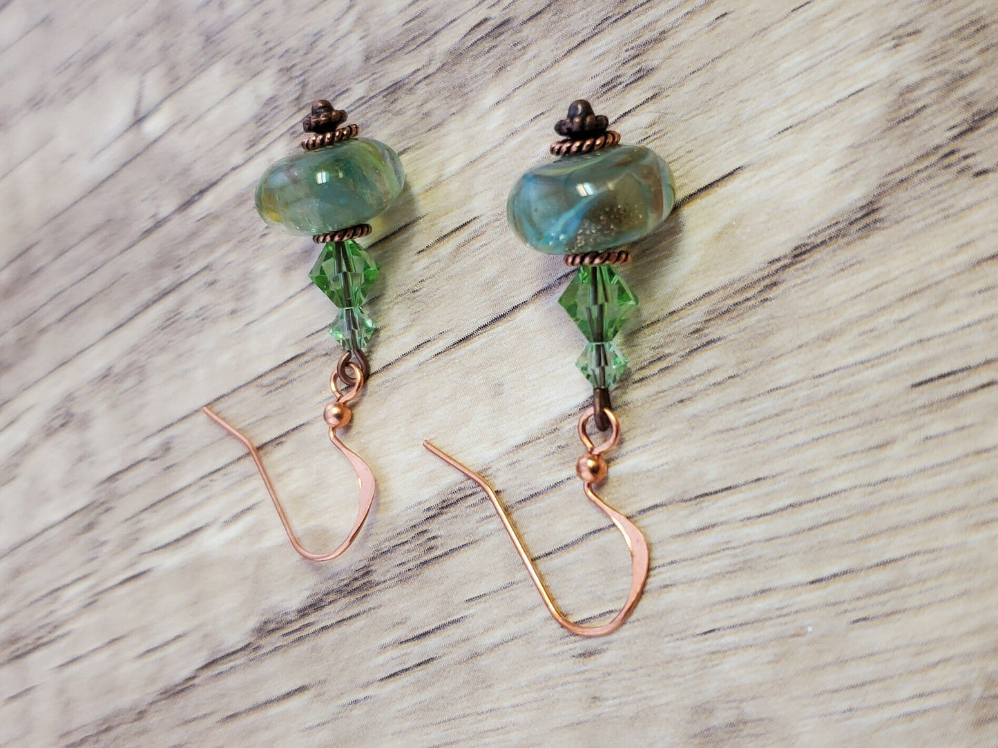 Feeling grand in Green Artisan Glass Earrings, Lampwork Glass Bead handcrafted by a talented artisan, Copper Earring Wire