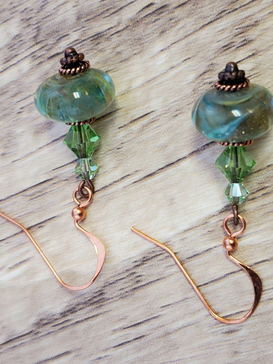 Feeling grand in Green Artisan Glass Earrings, Lampwork Glass Bead handcrafted by a talented artisan, Copper Earring Wire