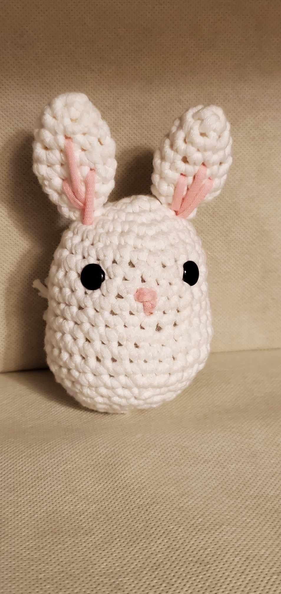 Handcrafted crocheted bunny buddy named Judy. White with pink ears and nose.