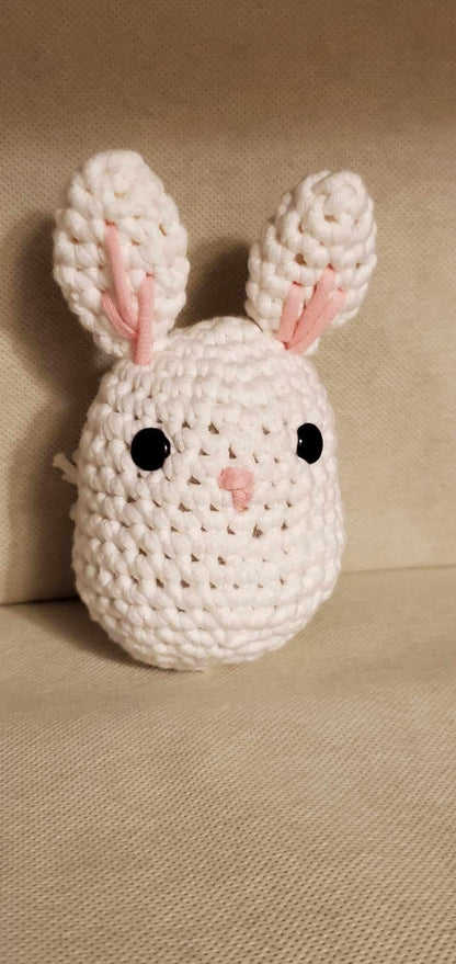 Handcrafted crocheted bunny buddy named Judy. White with pink ears and nose.
