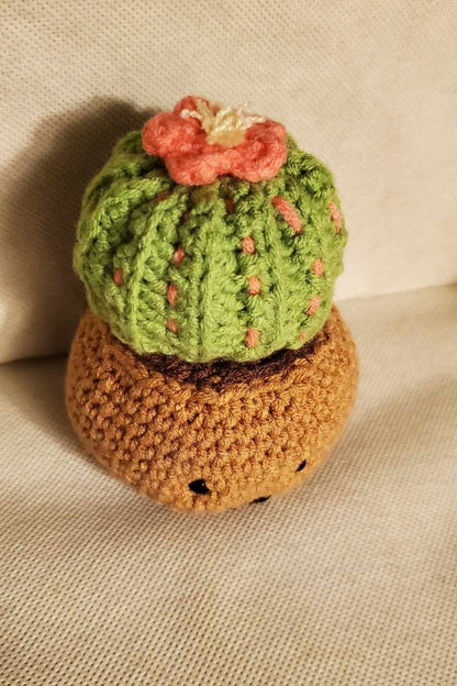 Cute handmade crochet cactus in a pot.