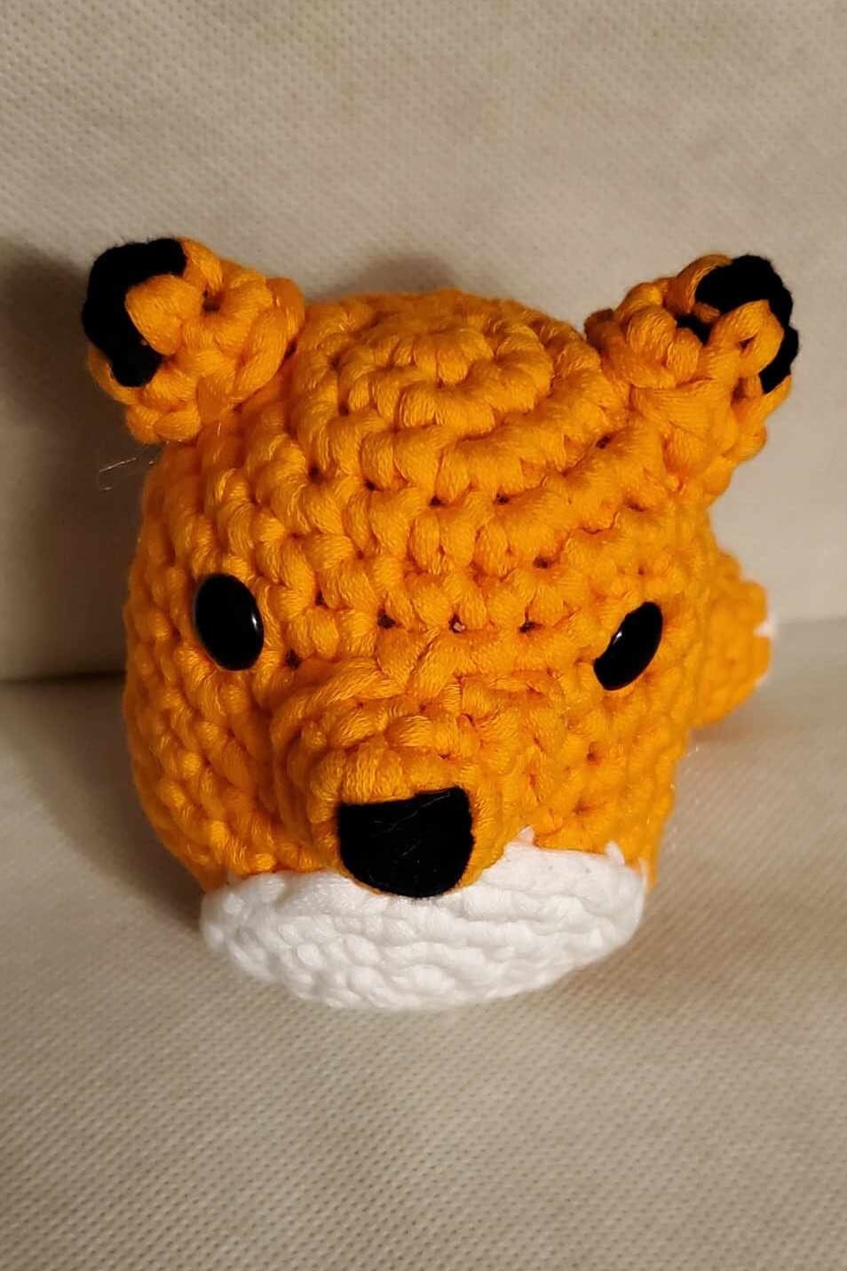 Handcrafted crocheted fox buddy named Copper. Orange and White with black tipped ears.