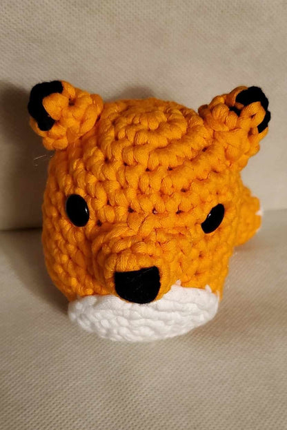 Handcrafted crocheted fox buddy named Copper. Orange and White with black tipped ears.