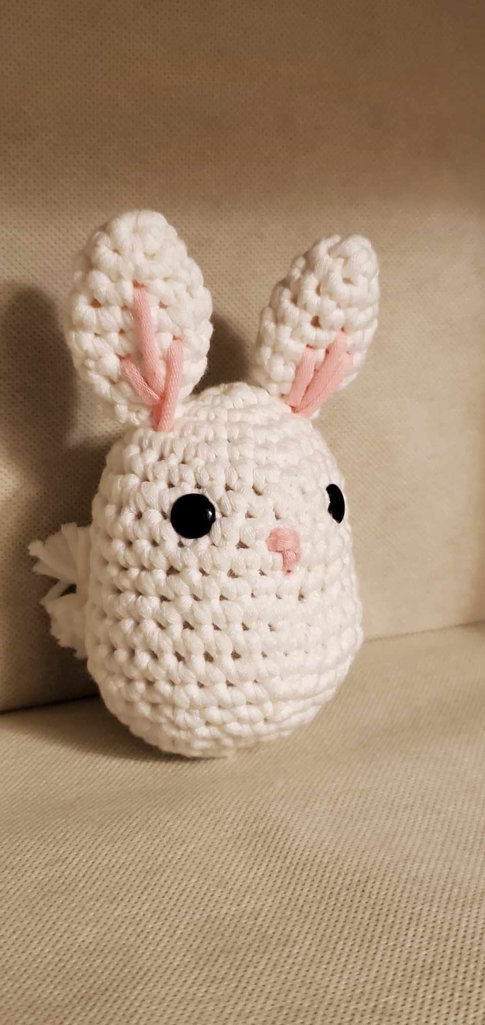 Handcrafted crocheted bunny buddy named Judy. White with pink ears and nose.